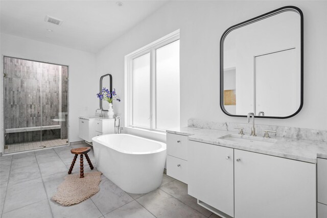 2215 Albans Rd, Houston, TX 77005 - full bath with two vanities, a shower stall, and a soaking tub