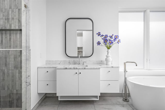 2215 Albans Rd, Houston, TX 77005 - full bath featuring vanity, a freestanding tub, and a stall shower