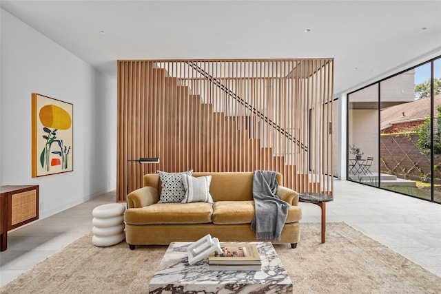 2215 Albans Rd, Houston, TX 77005 - living area featuring floor to ceiling windows and tile patterned flooring
