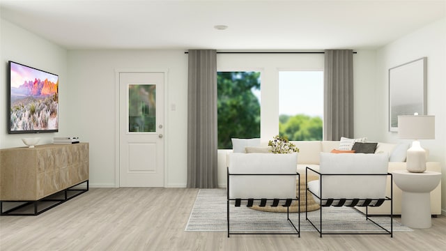 bedroom featuring wood finished floors and baseboards