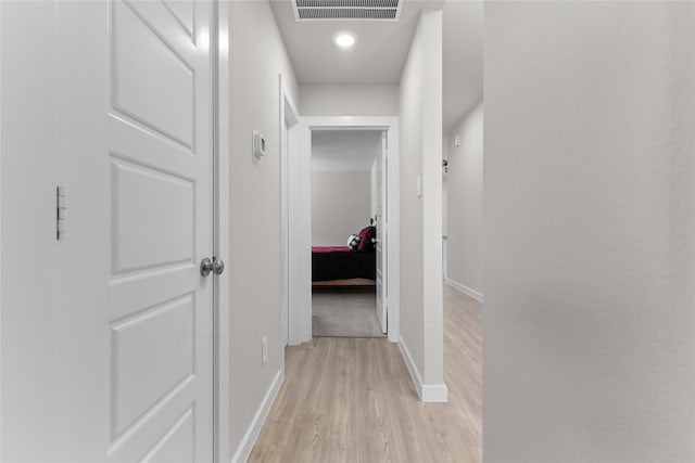 119 Comber Rd, Magnolia, TX 77354 - hallway featuring baseboards, visible vents, and light wood-type flooring