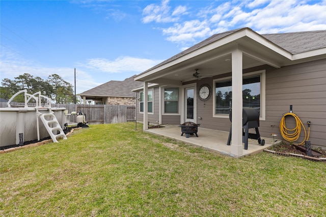 119 Comber Rd, Magnolia, TX 77354 - view of yard with an outdoor fire pit, a fenced backyard, ceiling fan, and a patio