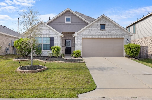 119 Comber Rd, Magnolia, TX 77354 - view of front facade with driveway, brick siding, a garage, and a front yard