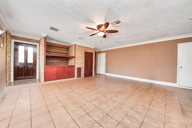 9926 Caffrey St, Houston, TX 77075 - unfurnished living room with a ceiling fan, a textured ceiling, baseboards, ornamental molding, and light tile patterned floors