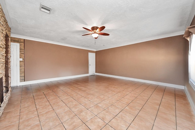 9926 Caffrey St, Houston, TX 77075 - empty room featuring ceiling fan, a textured ceiling, baseboards, and light tile patterned floors