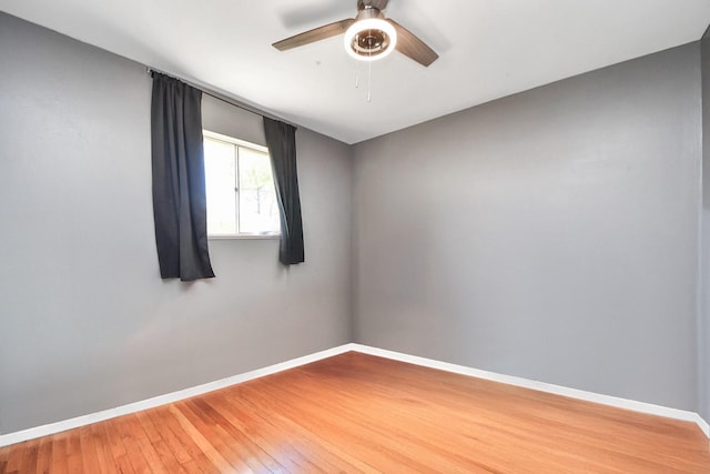 9926 Caffrey St, Houston, TX 77075 - empty room with baseboards, light wood finished floors, and ceiling fan