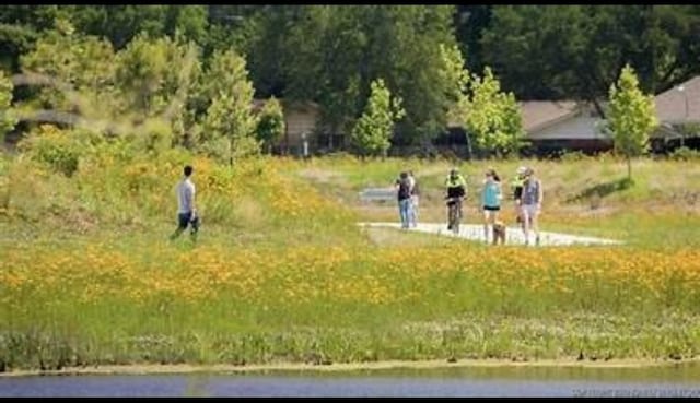 view of property's community featuring a water view