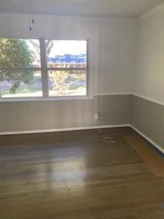 5535 Spellman Rd, Houston, TX 77096 - unfurnished room with baseboards, crown molding, and wood finished floors