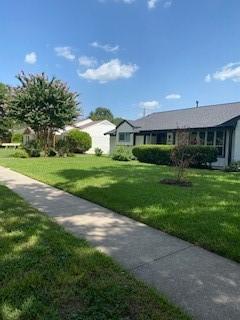 5535 Spellman Rd, Houston, TX 77096 - exterior space featuring a lawn