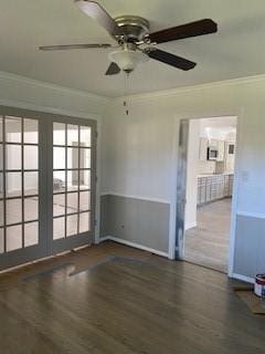 5535 Spellman Rd, Houston, TX 77096 - spare room with wood finished floors, a ceiling fan, and ornamental molding