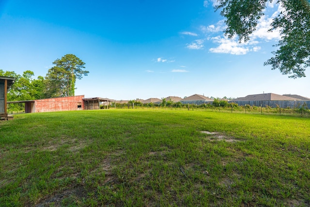 view of yard with fence