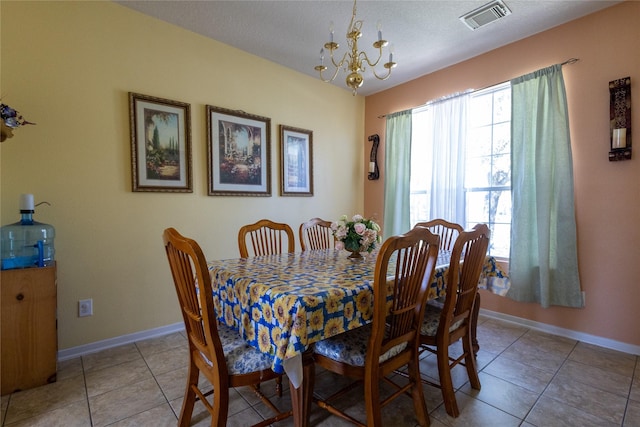 18531 Grove Brook Ln, Cypress, TX 77429 - dining area featuring a chandelier, baseboards, and light tile patterned floors