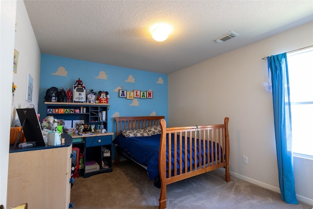 18531 Grove Brook Ln, Cypress, TX 77429 - bedroom with carpet floors, a textured ceiling, and baseboards