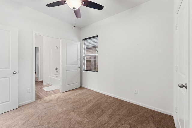 unfurnished bedroom featuring baseboards, ceiling fan, and carpet floors