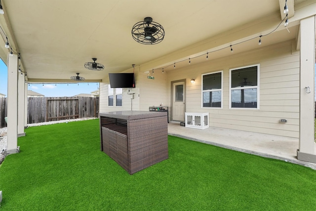 exterior space with a patio and fence