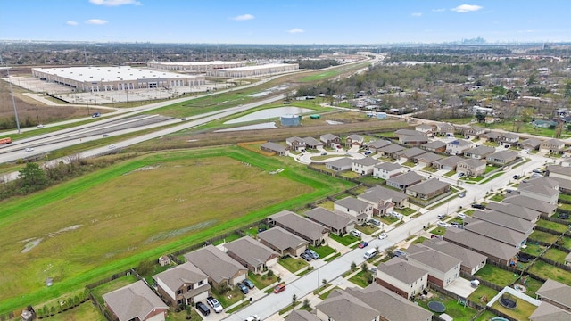 birds eye view of property with a residential view