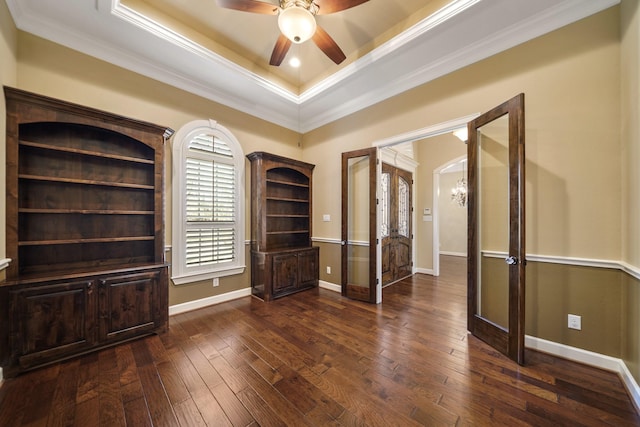 33922 High Point Dr, Magnolia, TX 77355 - spare room with french doors, a raised ceiling, ceiling fan, crown molding, and dark wood-style floors
