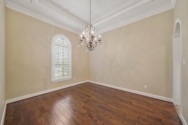 33922 High Point Dr, Magnolia, TX 77355 - empty room with dark wood-style floors, a chandelier, ornamental molding, and a raised ceiling