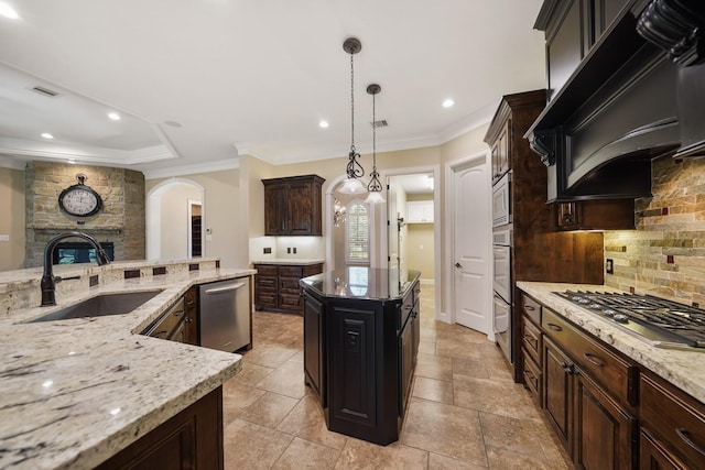 33922 High Point Dr, Magnolia, TX 77355 - kitchen featuring stainless steel appliances, custom range hood, tasteful backsplash, crown molding, and arched walkways