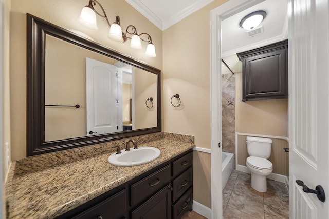 33922 High Point Dr, Magnolia, TX 77355 - bathroom with vanity, crown molding, shower / tub combination, and a wainscoted wall