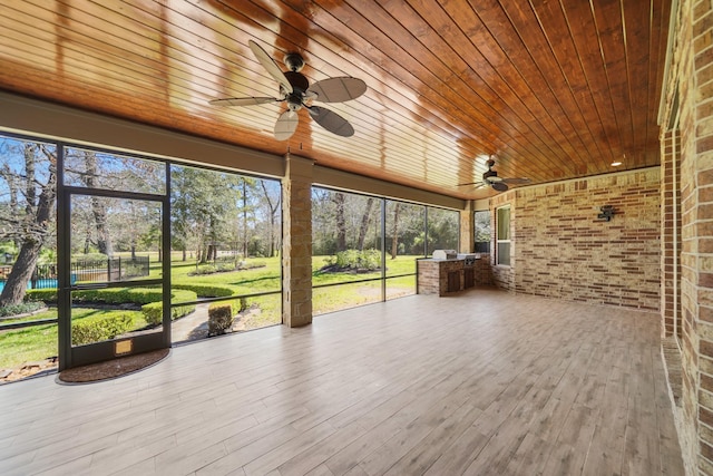 33922 High Point Dr, Magnolia, TX 77355 - unfurnished sunroom featuring ceiling fan and healthy amount of natural light
