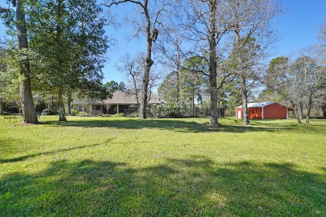 33922 High Point Dr, Magnolia, TX 77355 - view of yard with an outbuilding
