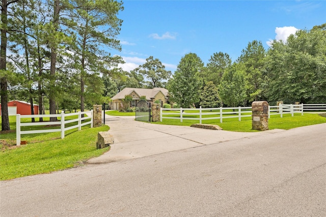 33922 High Point Dr, Magnolia, TX 77355 - view of concrete surface featuring a gated entry