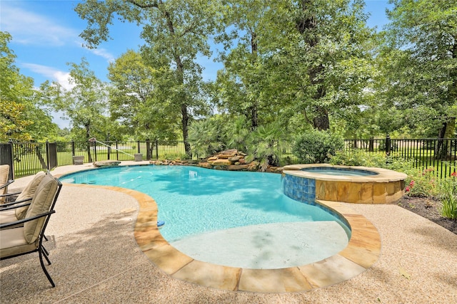 33922 High Point Dr, Magnolia, TX 77355 - view of swimming pool featuring a pool with connected hot tub