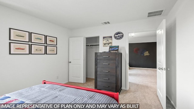 carpeted bedroom featuring visible vents and baseboards