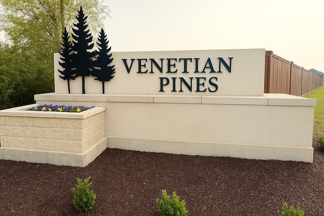 view of community sign