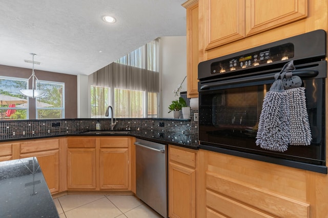 1906 Blue Water Bay Dr, Katy, TX 77494 - kitchen featuring decorative backsplash, oven, dishwasher, a sink, and light tile patterned floors