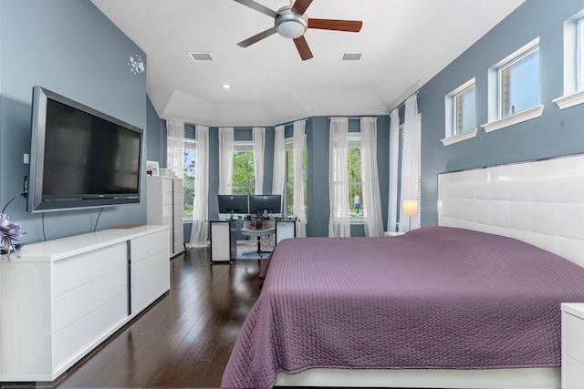 1906 Blue Water Bay Dr, Katy, TX 77494 - bedroom with dark wood finished floors, recessed lighting, lofted ceiling, and visible vents