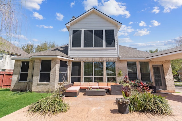 1906 Blue Water Bay Dr, Katy, TX 77494 - rear view of property with a patio, outdoor lounge area, brick siding, a shingled roof, and a yard