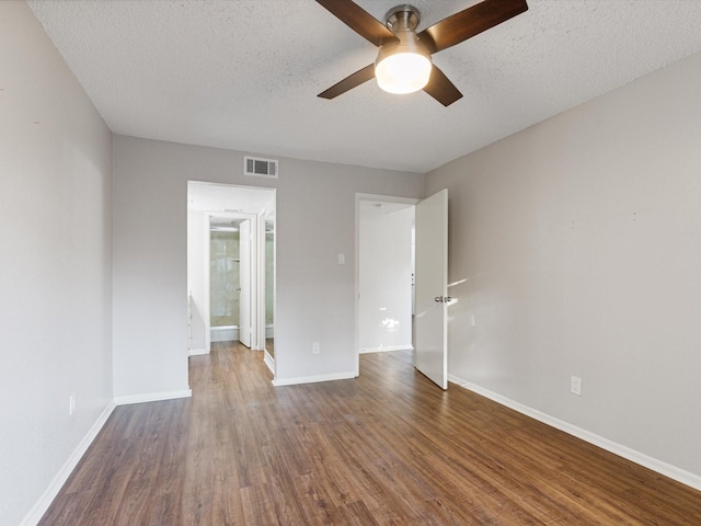 2800 Jeanetta St Unit 2803, Houston, TX 77063 - empty room with baseboards, a ceiling fan, wood finished floors, and visible vents