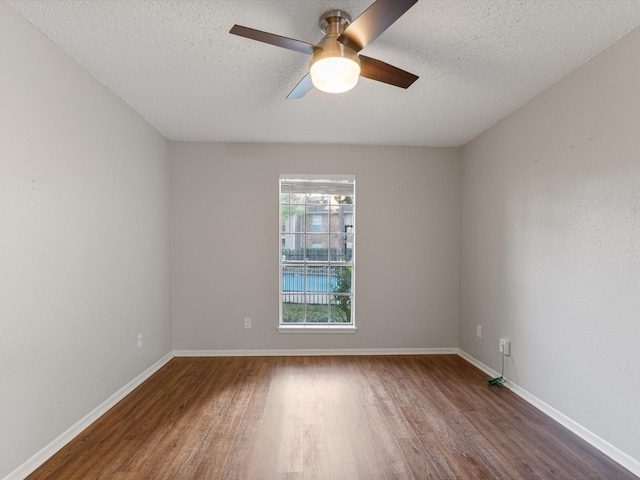 2800 Jeanetta St Unit 2803, Houston, TX 77063 - spare room with a textured ceiling, a ceiling fan, and wood finished floors