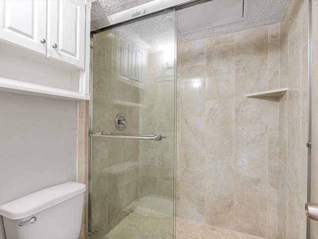 2800 Jeanetta St Unit 2803, Houston, TX 77063 - bathroom featuring a shower stall and toilet