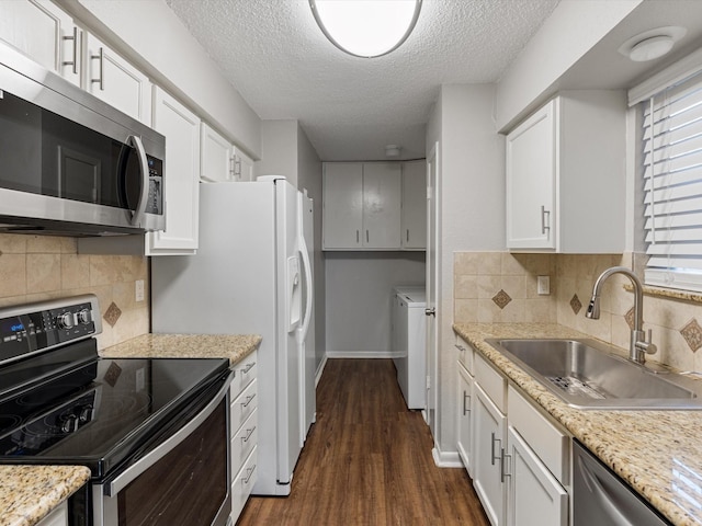 2800 Jeanetta St Unit 2803, Houston, TX 77063 - kitchen with dark wood-style flooring, a textured ceiling, white cabinets, a sink, and stainless steel appliances