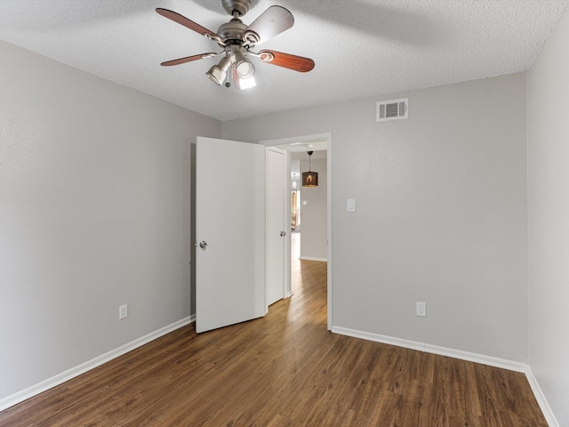 2800 Jeanetta St Unit 2803, Houston, TX 77063 - spare room with baseboards, ceiling fan, wood finished floors, and visible vents