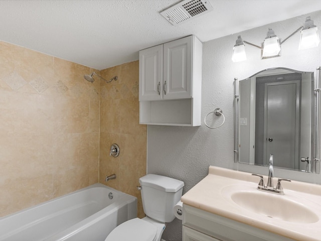 2800 Jeanetta St Unit 2803, Houston, TX 77063 - bathroom with visible vents, bathtub / shower combination, vanity, toilet, and a textured wall