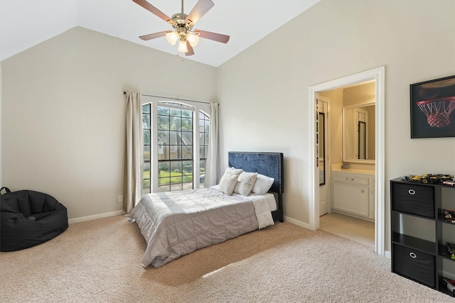 carpeted bedroom with ceiling fan, baseboards, connected bathroom, and lofted ceiling