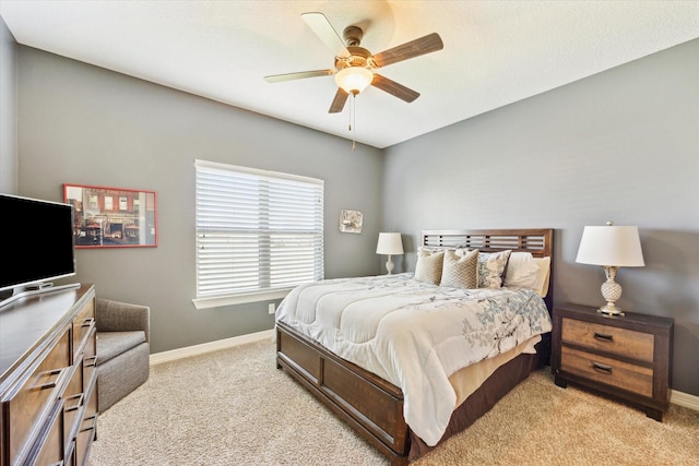 2688 Settlers Way Dr, Sealy, TX 77474 - bedroom with baseboards, carpet floors, and a ceiling fan