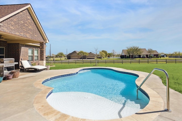 2688 Settlers Way Dr, Sealy, TX 77474 - view of pool with a fenced in pool, a fenced backyard, a patio, grilling area, and a yard