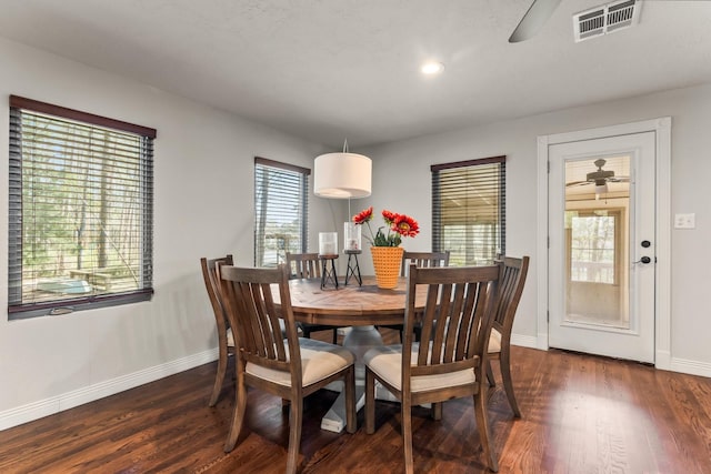 dining room featuring baseboards, visible vents, ceiling fan, recessed lighting, and dark wood-style flooring