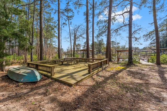 view of yard with a wooden deck