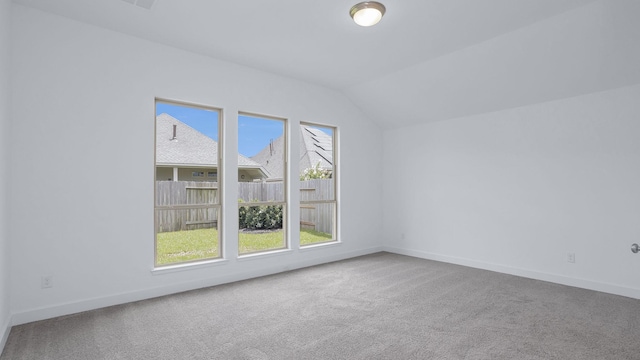 19415 Sorrel Stallion Trl, Tomball, TX 77377 - carpeted empty room featuring vaulted ceiling and baseboards