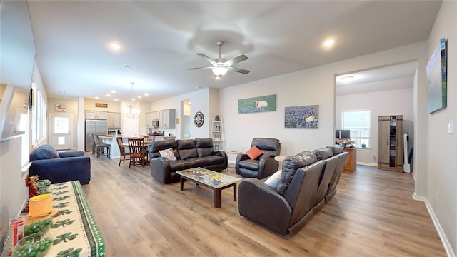 21586 Jordan Pond Rdg, Porter, TX 77365 - living area featuring light wood-type flooring, a ceiling fan, recessed lighting, and baseboards