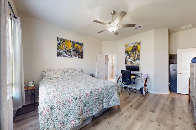 21586 Jordan Pond Rdg, Porter, TX 77365 - bedroom featuring light wood-style flooring, a desk, baseboards, ceiling fan, and fridge