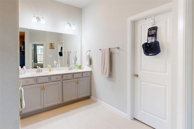 21586 Jordan Pond Rdg, Porter, TX 77365 - bathroom featuring double vanity and baseboards