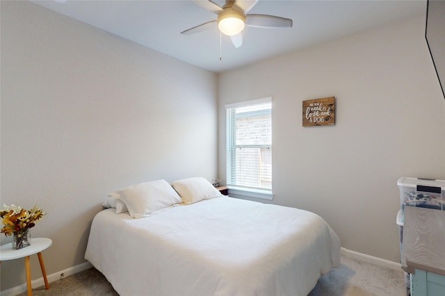 21586 Jordan Pond Rdg, Porter, TX 77365 - bedroom featuring light carpet, baseboards, and a ceiling fan