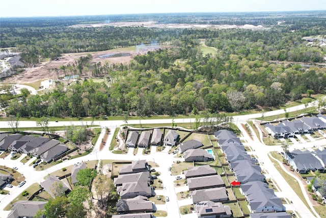 21586 Jordan Pond Rdg, Porter, TX 77365 - aerial overview of property's location with a forest and nearby suburban area